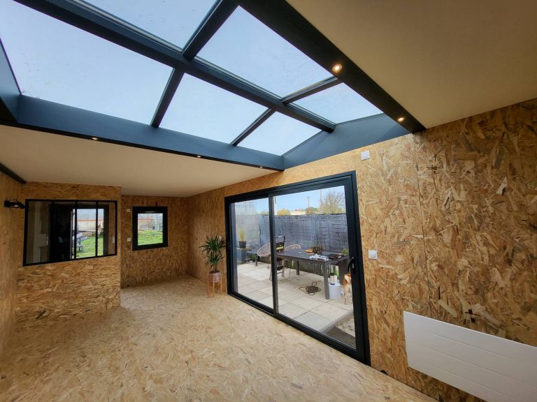 Extension maison RE2020 avec dôme verrier proche de Toulouse à Fontenilles (31)
